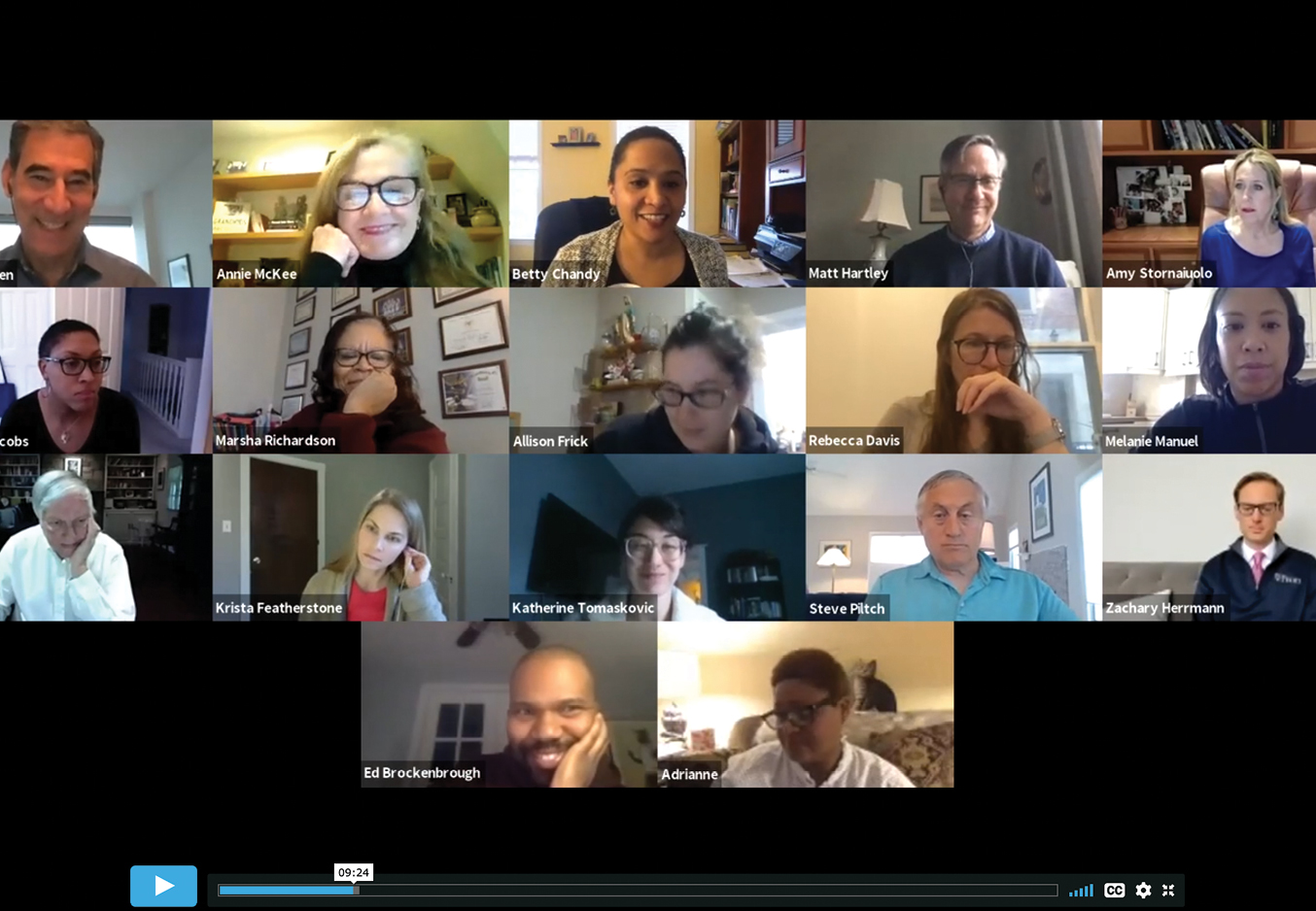 A video call with 17 Penn GSE faculty is screenshotted. Each person’s video screen appears in a small box, with many faces smiling or in mid-conversation, and home offices or living rooms are in each of the 17 backgrounds.