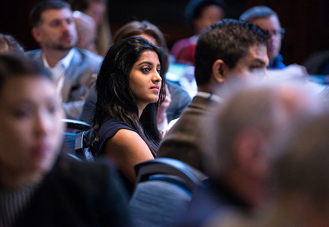 Audience listens attentively during the 2018 Milken-Penn GSE EBPC presentation