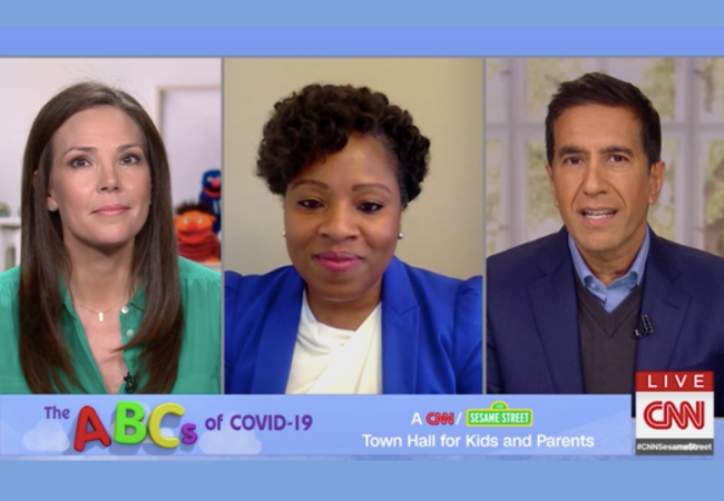 From left, CNN’s Erica Hill, Penn GSE graduate Sundai Riggins, and CNN’s Sanjay Gupta, appear on ABCs of COVID-19: A CNN/Sesame Street Town Hall for Kids and Parents. (CNN)