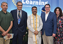From left to right, University Grants Commission Chairman Mamidala Jagadesh Kumar, Penn GSE's Raghu Krishnamoorthy, Education Minister Shri Dharmendra Pradhan, and Penn GSE's Peter Eckel and Sharon Ravitch at Penn GSE and Anant National University's Future of Learning event in Ahmedabad, India.
