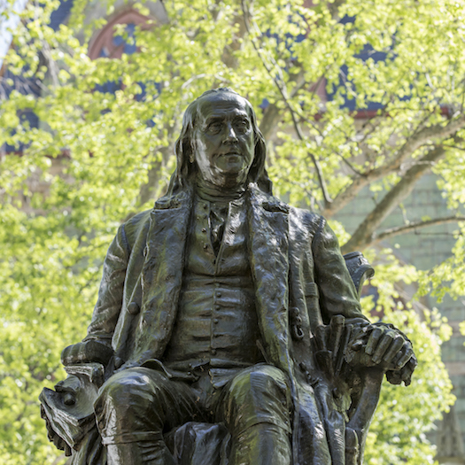 Statue of Ben Franklin outside College Hall.