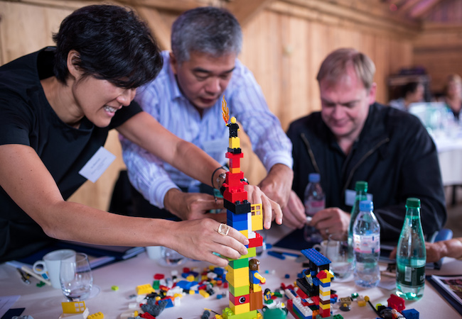 Three participants take part in an ERFIP workshop.