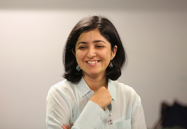 Ameena Ghaffar-Kucher in a classroom. 