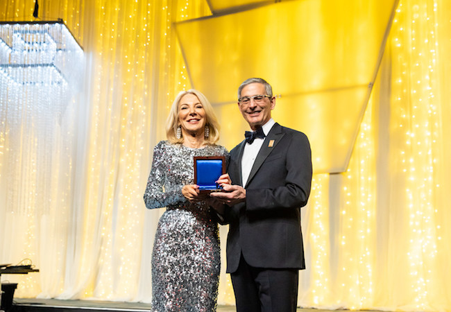 Penn President Amy Gutmann accepts the Pennsylvania Society Gold Medal for Distinguished Achievement.