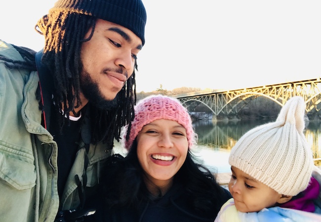 Janay Garrett, center, with her husband James and their daughter. 