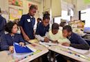 Students in a class at the Henry C. Lea School study. 