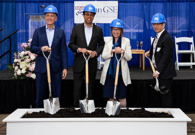 Standing from left to right with shovels, Doug Korn, Wendell Pritchett, Pam Grossman, and Philip Chen.