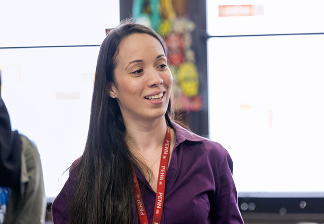 Young female teacher in classroom