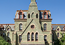 Penn's College Hall against a blue sky