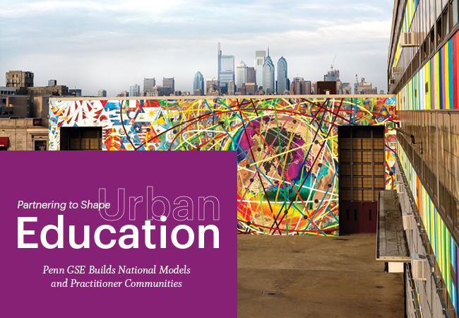 A colorful mural is painted on a South Philadelphia high school. The Philadelphia skyline is visible behind the school. A purple block in the lower left reads, “Spring 2020, Partnering to Shape Urban Education