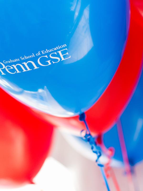 Red and blue balloons sporting the Penn GSE logo.