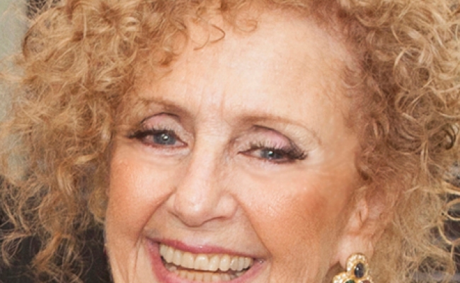 Smiling woman with curly hair