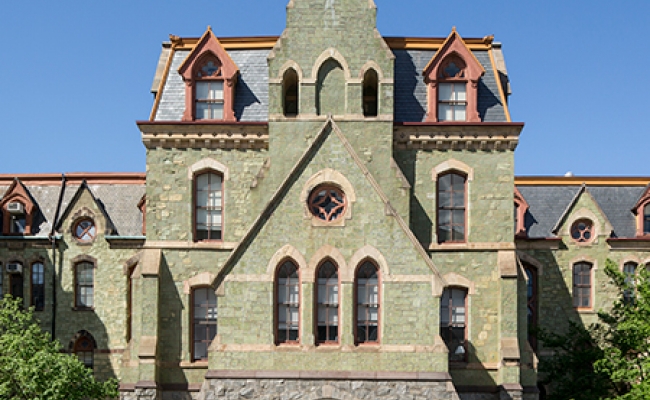 Penn's College Hall against a blue sky