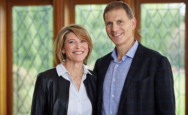 Headshot of Andrew Harris Jacobson and Marina Kunis Jacobson, G’93, WG’93