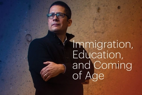 Profile shot shows Dr. Roberto Gonzales with hands crossed and looking over his right shoulder, against a gradient backdrop with blue and red color tones. White text on the image reads, “Immigration, Education, and Coming of Age.”