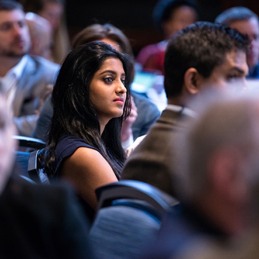 Audience listens attentively during the 2018 Milken-Penn GSE EBPC presentation