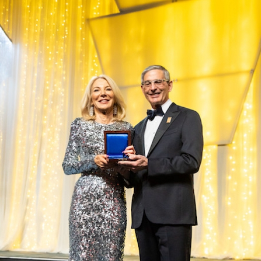 Penn President Amy Gutmann accepts the Pennsylvania Society Gold Medal for Distinguished Achievement.