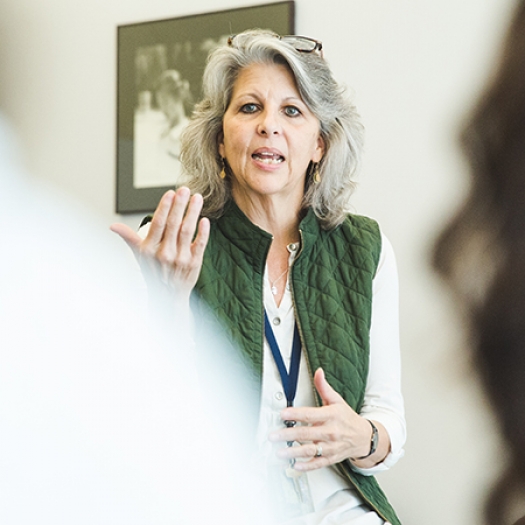 Caroline Watts speaks at a panel event about mental health in student populations.