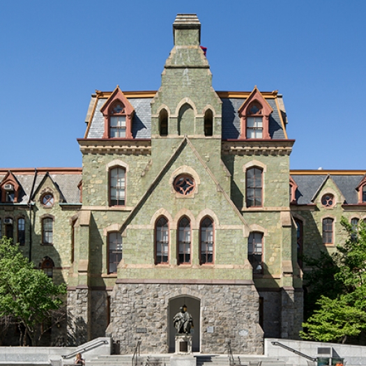 Penn's College Hall against a blue sky