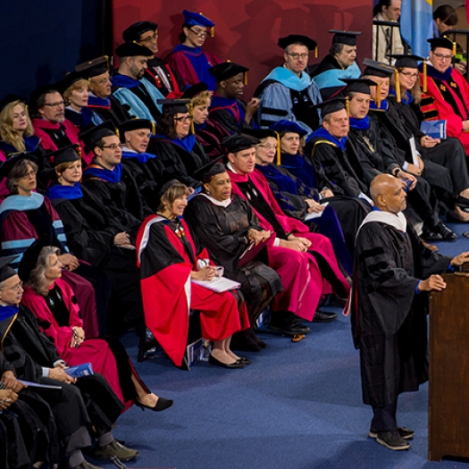 Penn GSE faculty seated onstage at Commencement