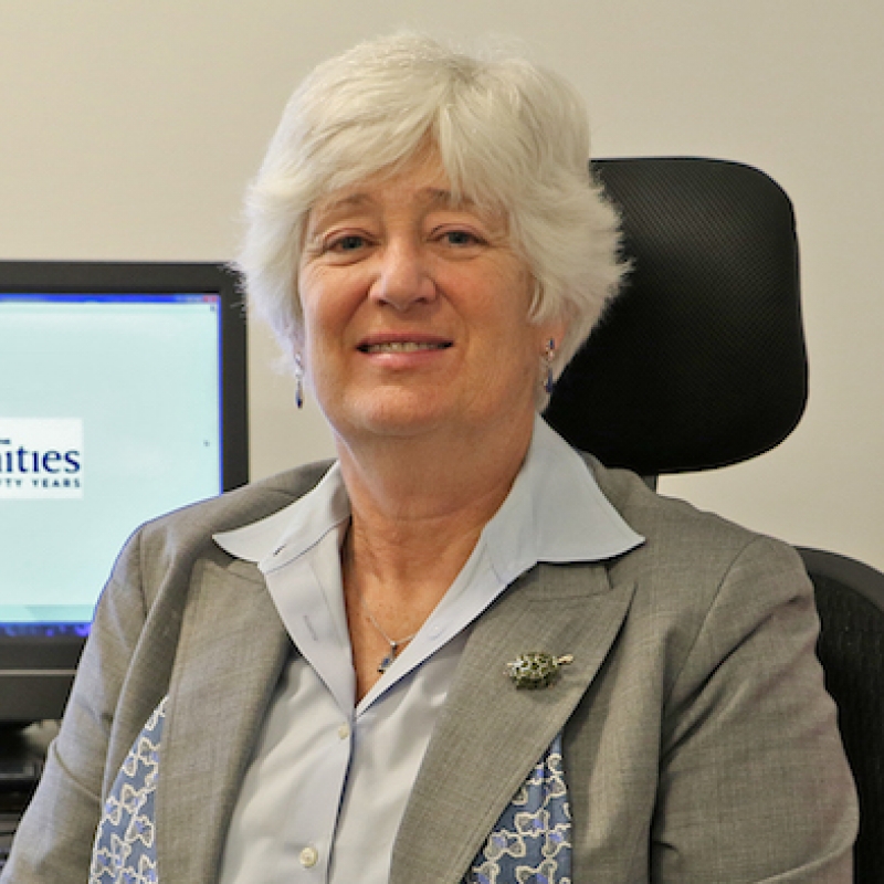 Woman with short, white hair