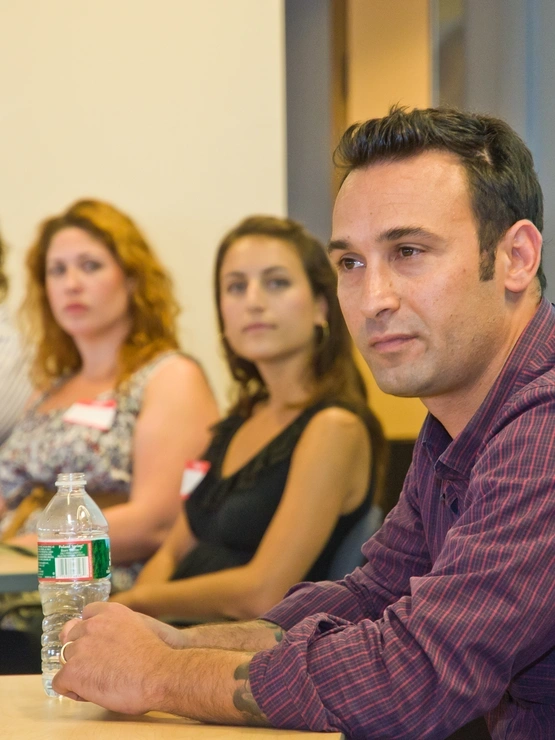 Four students of the School and Mental Health Counseling program sitting on a panel.