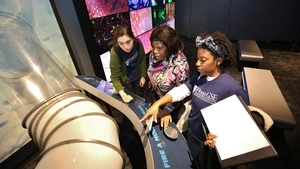 UTR students and Philadelphia youth in the VAST LIFE program during a trip to the Franklin Institute.