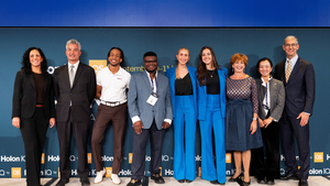 The 2025 Milken–Penn GSE Education Business Plan Competition finalists pose on stage with Penn GSE staff
