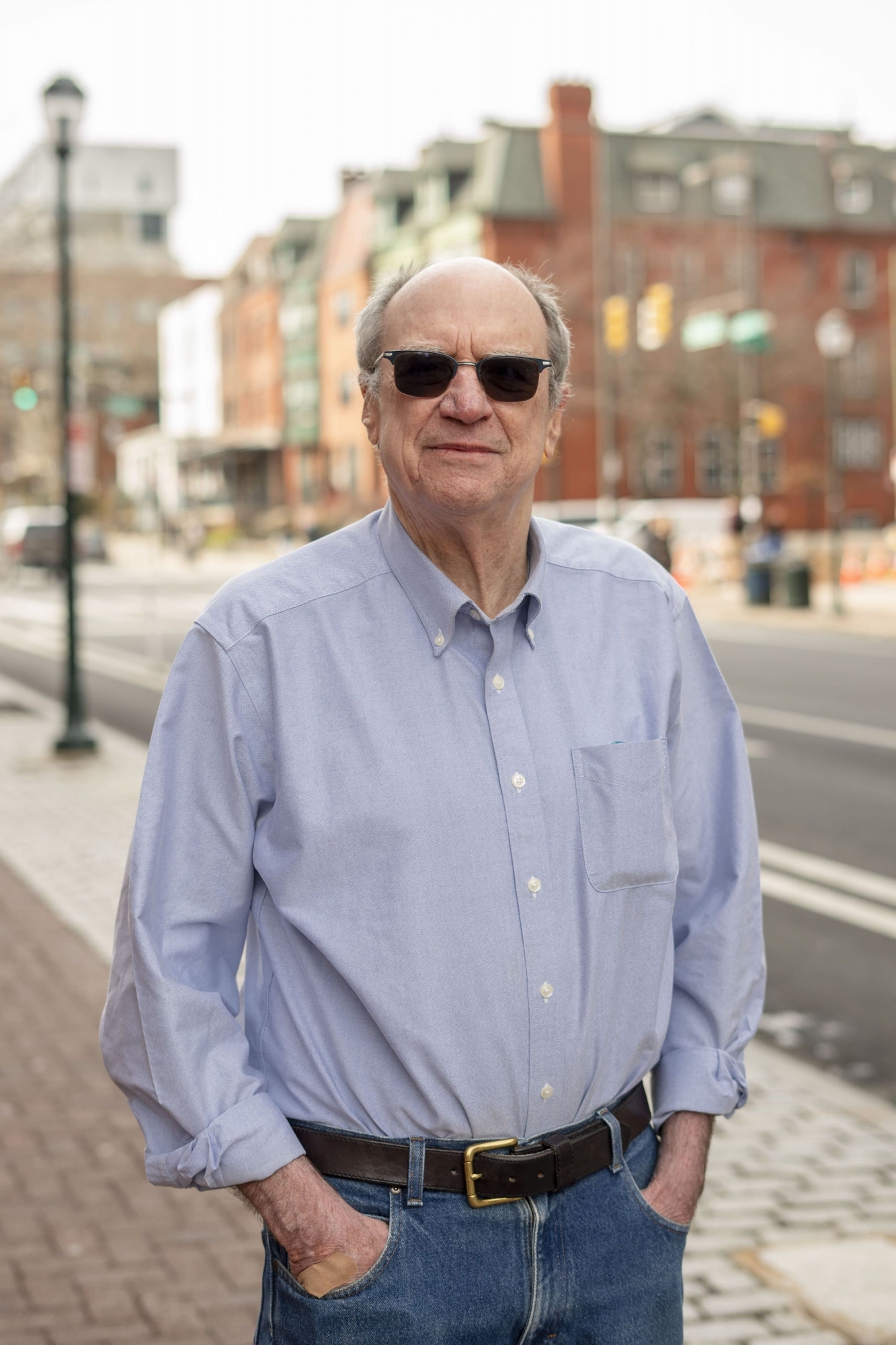Penn GSE Professor Emeritus <span>John Puckett stands along Walnut Street in West Philadelphia</span>