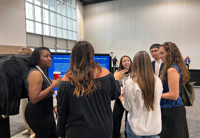 Penn GSE students present their research during a poster session at AERA 2025.