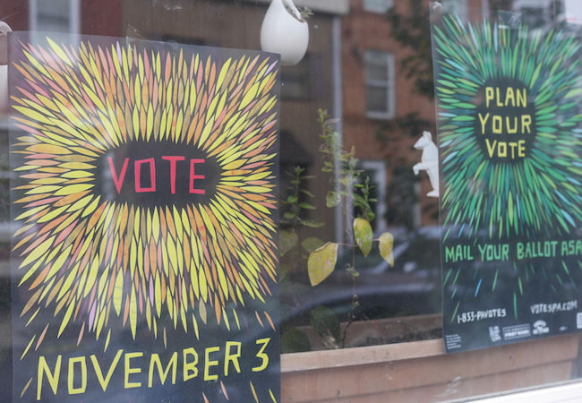 Signs encouraging people to vote. 