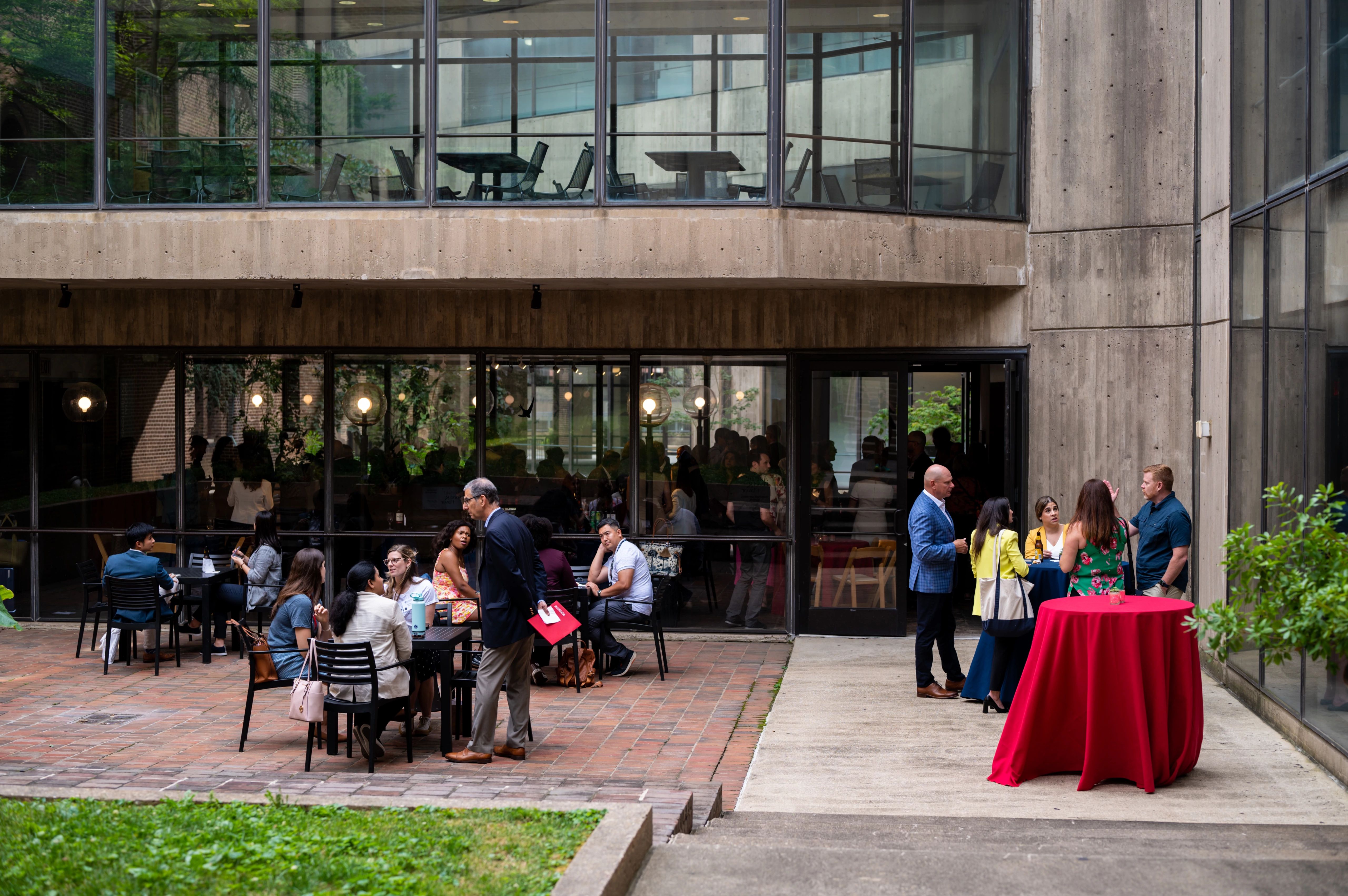 People sitting and talking outdoors