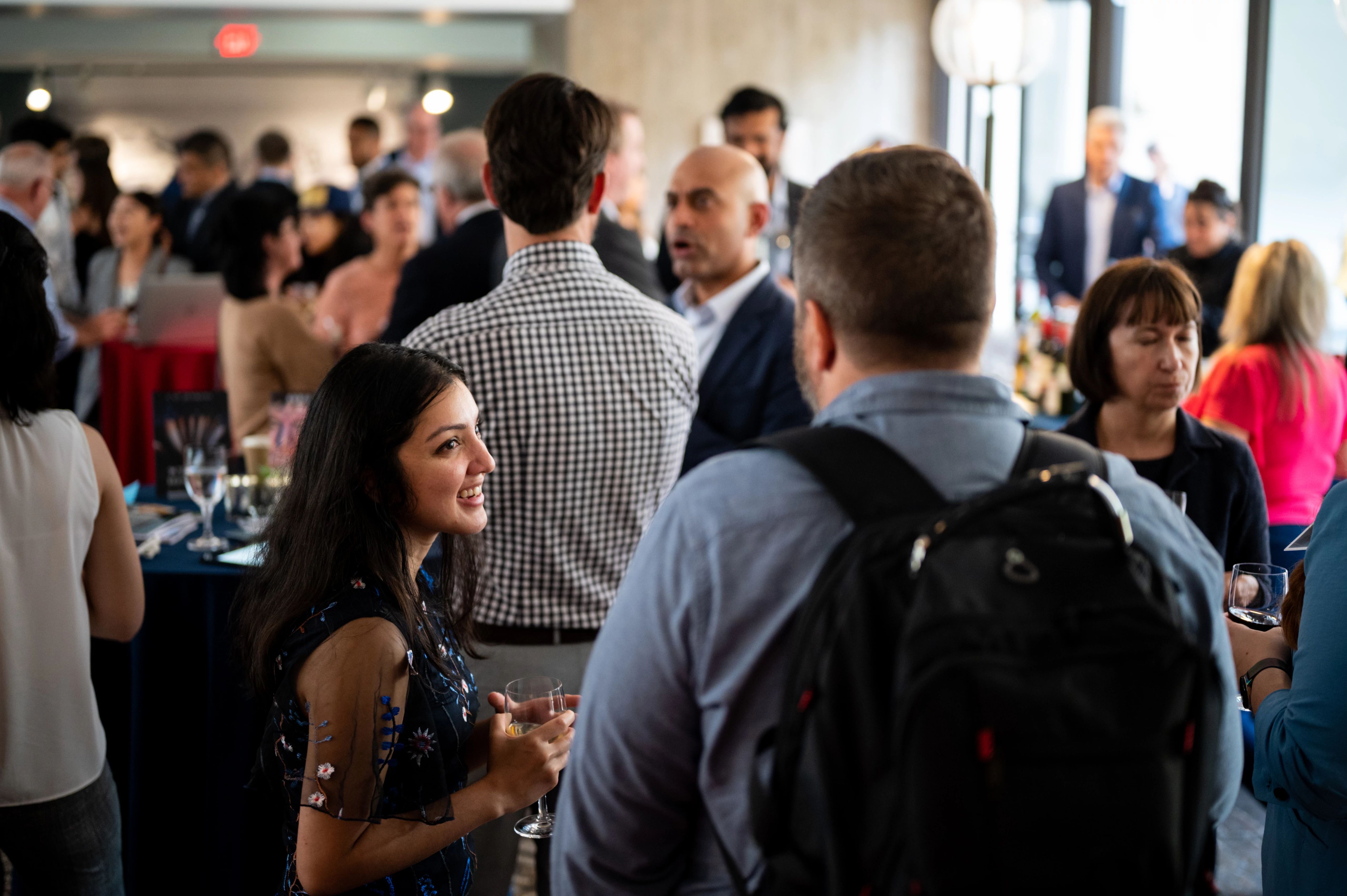 People talking around tables